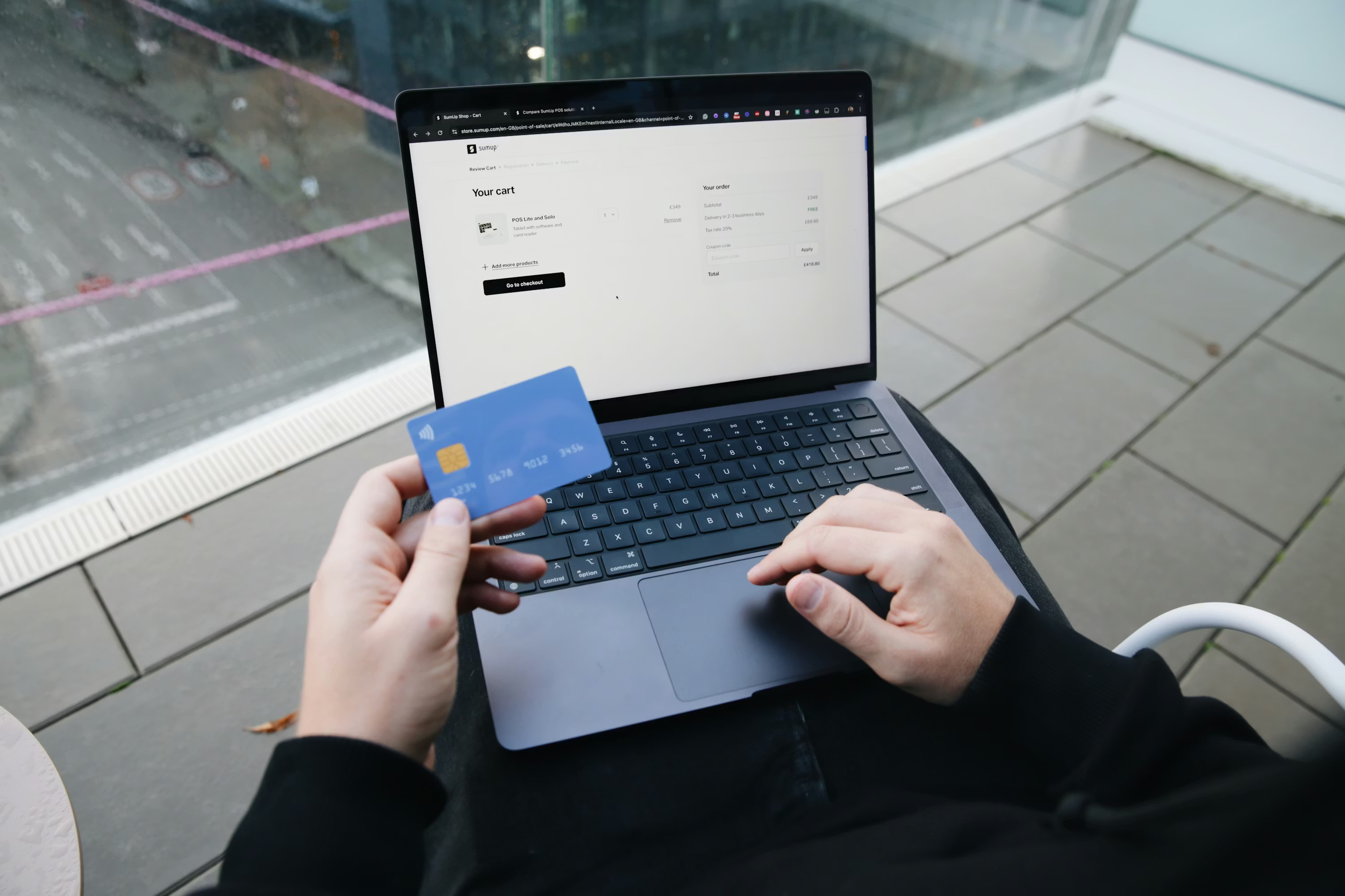 A user completing a ChatGPT Pro online subscription payment on a laptop