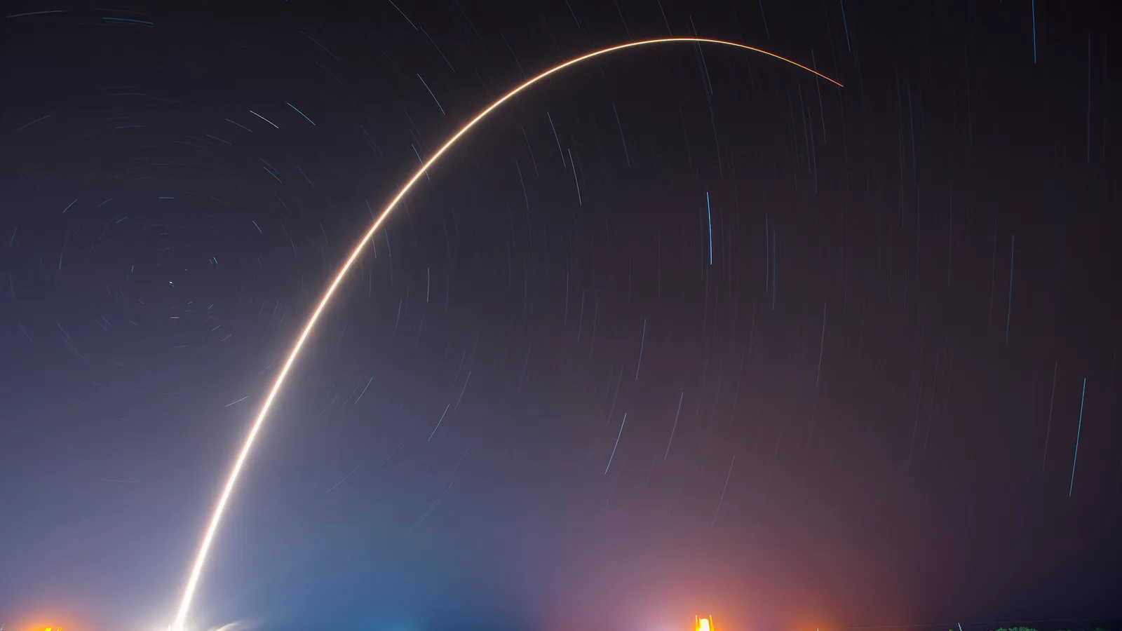 SpaceX rocket night launch trail, showing technical capability and scaled operations