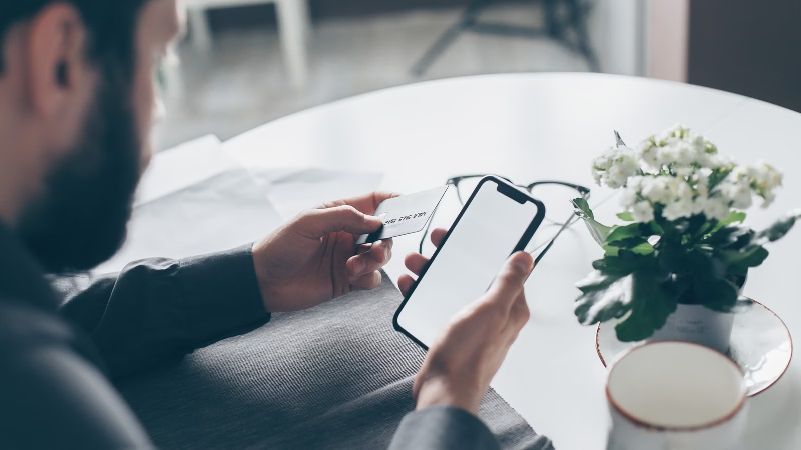 Person checking an online payment on a smartphone