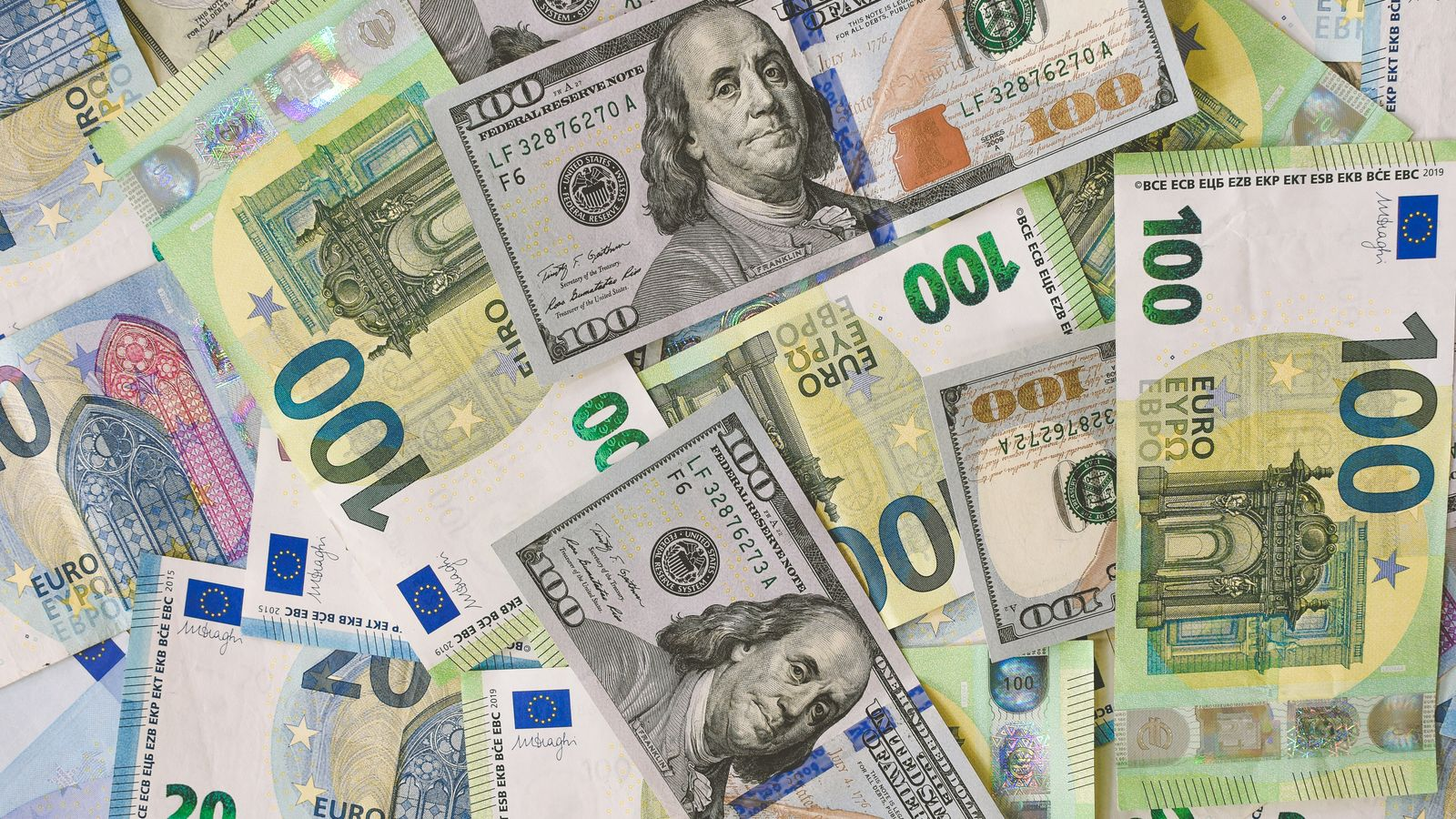 US dollar and euro banknotes representing different currency exchange needs